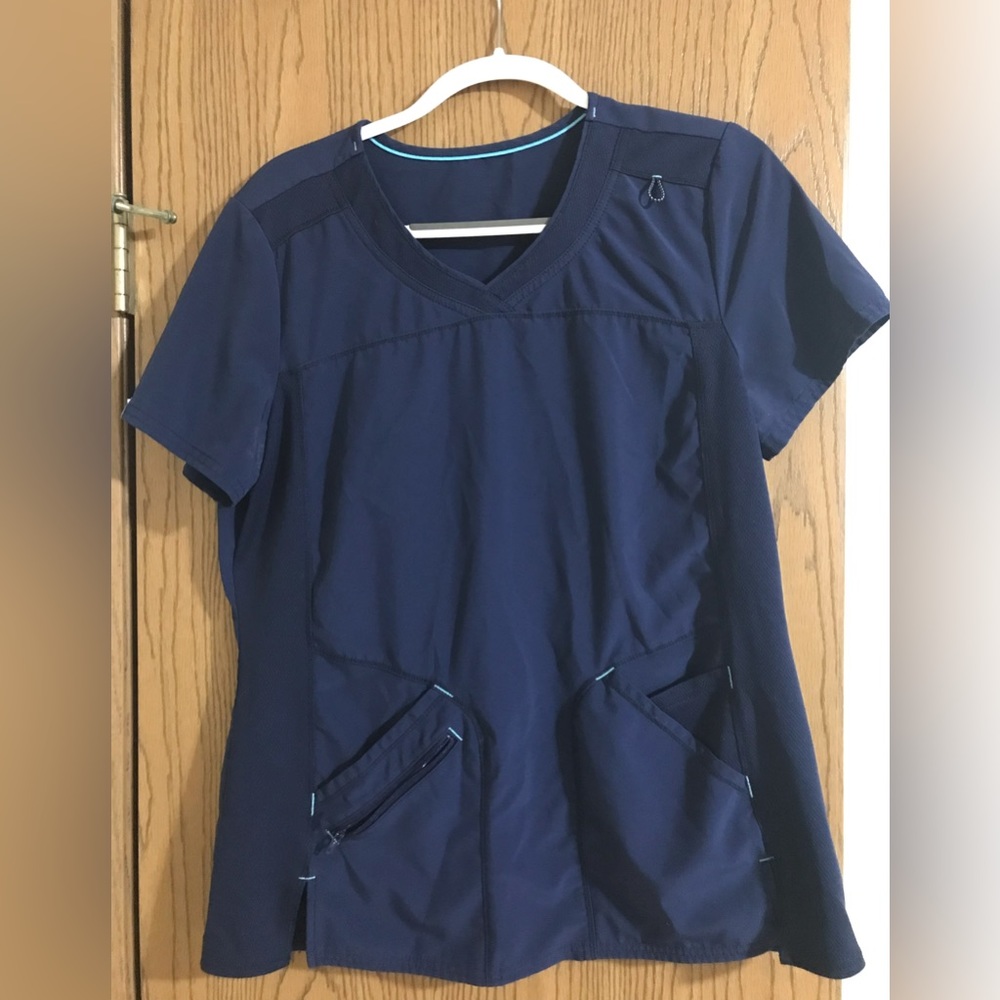 Navy blue Scrubstar scrub shirt. Size M. 90% polyester 10% spandex. 3 pockets.